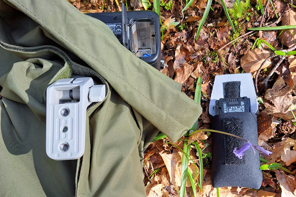 Our camera covers keep you going what ever the weather, and our lightweight Matt olive green waterproof cover would be perfect for Nature, Landscape, and sports photography. Photo also shows our neoprene battery pockets, perfect for storing a spare battery and insulating against the cold.