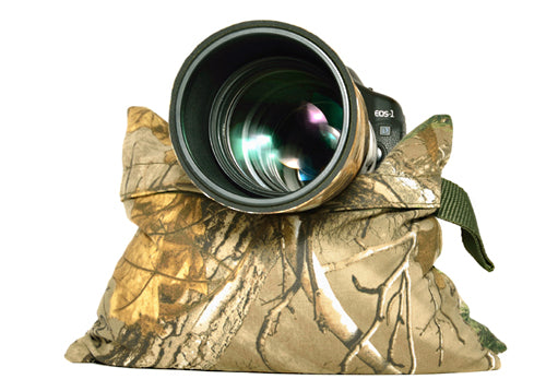 Our camera Double bean bag has been designed to give extra support and better grip to your camera and lens. Our bean bags have been made to last with extra strong thread and double stitching. We use a proofed brushed polycotton material which grips and moulds to the shape of your camera & lens and to where the camera bean bag is positioned whether it's a rock post or car door. We don't use nylon as it tends to be shiny and the camera & lens can easily slip off the bean bag.