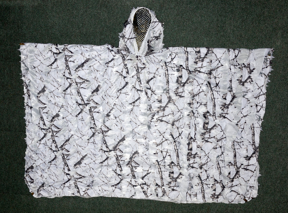 Leafy Poncho, super lightweight & compact. 1.7mt wide 2.2mt long with hood and face veil. Can also be used as a camouflage cover or screen. Made from 3D leafy material on a tough fine mesh base. An excellent quick use lightweight camouflage Lightweight - Compact - Multi use - Quick drying Camouflage Poncho/Cover/Screen.