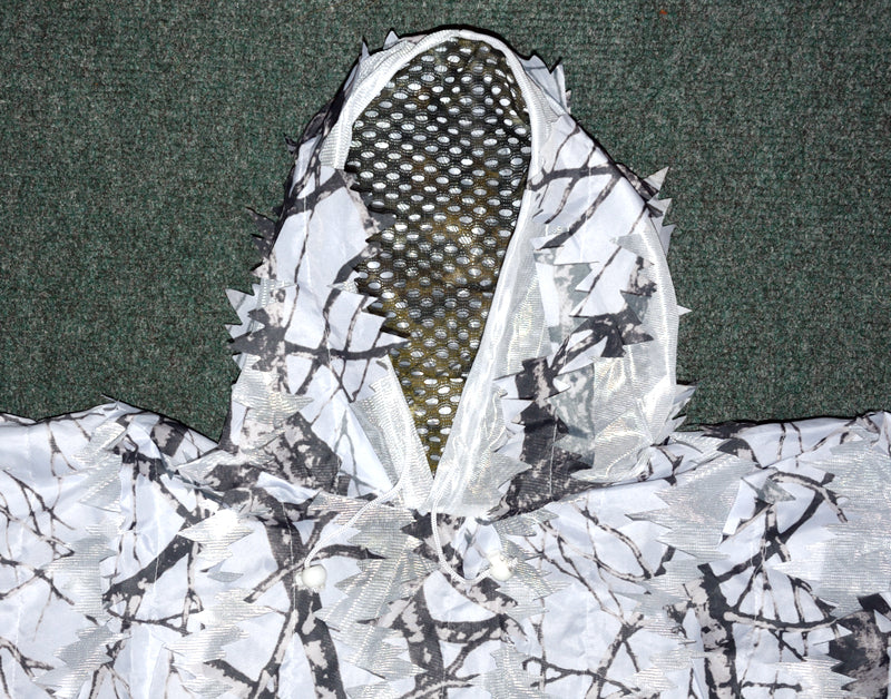 Leafy Poncho, super lightweight & compact. 1.7mt wide 2.2mt long with hood and face veil. Can also be used as a camouflage cover or screen. Made from 3D leafy material on a tough fine mesh base. An excellent quick use lightweight camouflage Lightweight - Compact - Multi use - Quick drying Camouflage Poncho/Cover/Screen.