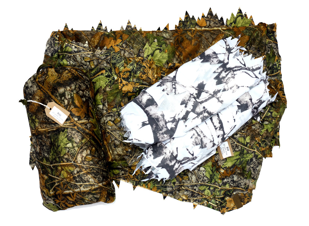 Leafy Poncho, super lightweight & compact. 1.7mt wide 2.2mt long with hood and face veil. Can also be used as a camouflage cover or screen. Made from 3D leafy material on a tough fine mesh base. An excellent quick use lightweight camouflage Lightweight - Compact - Multi use - Quick drying Camouflage Poncho/Cover/Screen. The photo also shows our C80FS Four Seasons Camera cover and B29.5 Leafy gloves.
