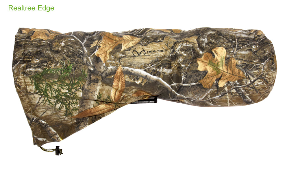 Waterproof and insulated camera covers, camera protection and Realtree camera camouflage, camera rain covers, dust and snow covers. Our 'Four Season' camera covers reduce battery drain & shutter sound. We first designed our heated camera covers for use by the British forces. The cover has four layers of technical fabrics including a fleece lining with a heat pack pocket, ideal for nature photography, wildlife photography and outdoor photography protecting your outdoor photography gear and long lenses.