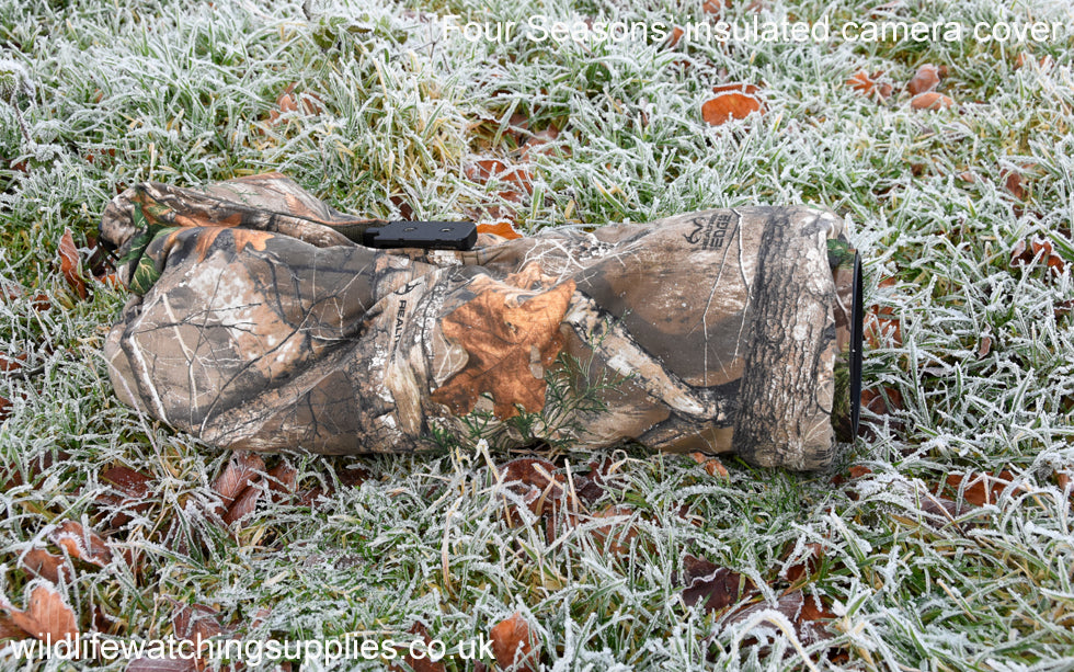 Waterproof and insulated camera covers, camera protection and Realtree camera camouflage, camera rain covers, dust and snow covers. Our 'Four Season' camera covers reduce battery drain & shutter sound. We first designed our heated camera covers for use by the British forces. The cover has four layers of technical fabrics including a fleece lining with a heat pack pocket, ideal for nature photography, wildlife photography and outdoor photography protecting your outdoor photography gear and long lenses.