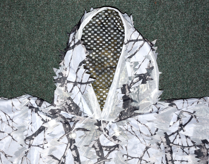 Leafy Poncho, super lightweight & compact. 1.7mt wide 2.2mt long with hood and face veil. Can also be used as a camouflage cover or screen. Made from 3D leafy material on a tough fine mesh base. An excellent quick use lightweight camouflage Lightweight - Compact - Multi use - Quick drying Camouflage Poncho/Cover/Screen. 